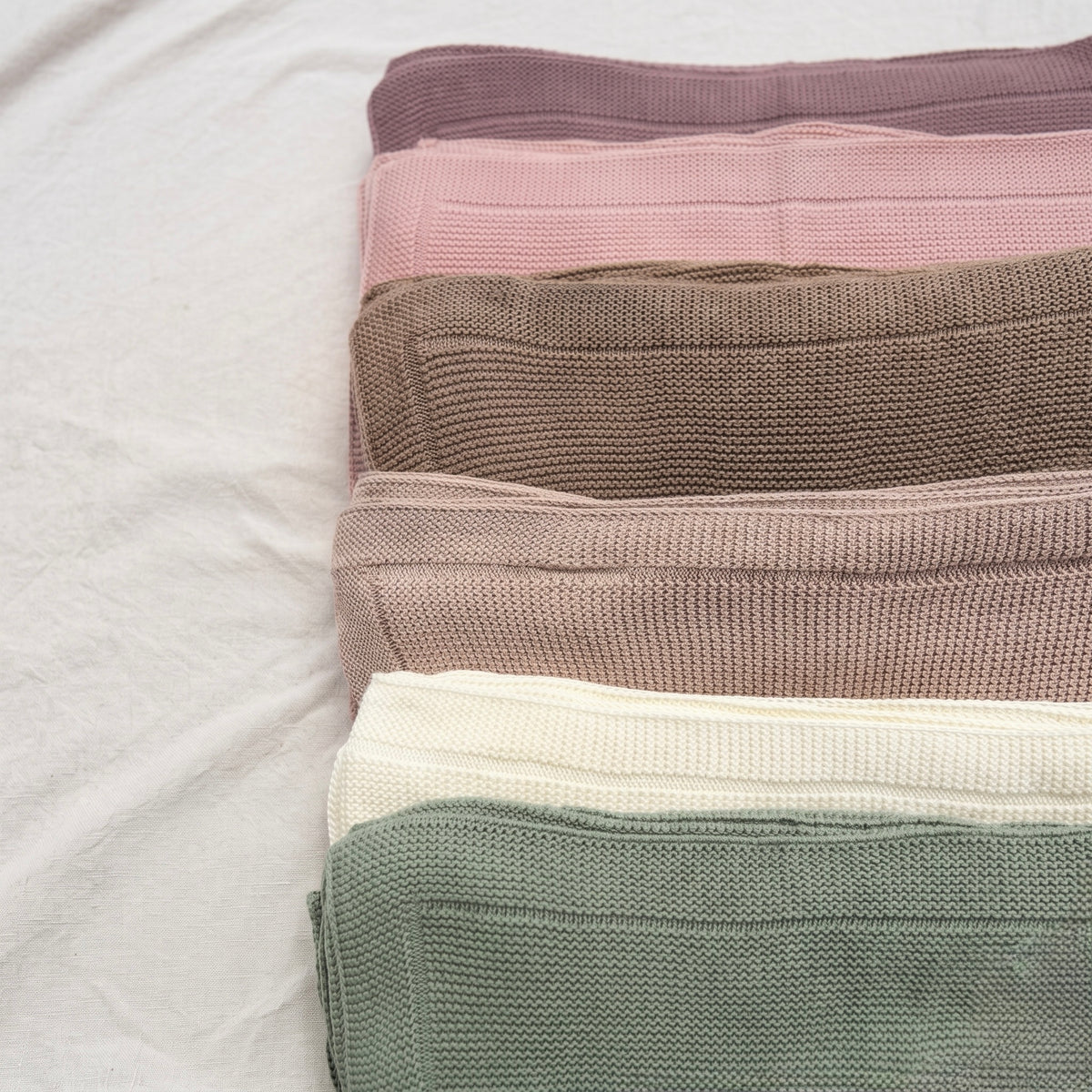 Couverture en maille douce pour envelopper bébé